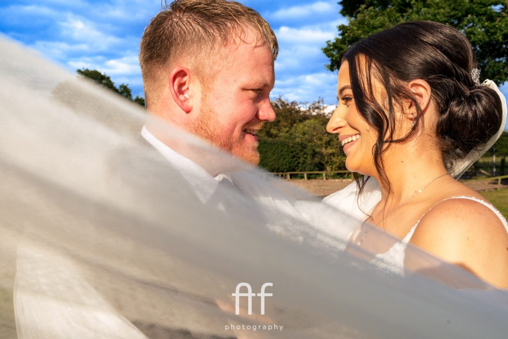 Oak Farm Hotel bride and groom portrait in the summer