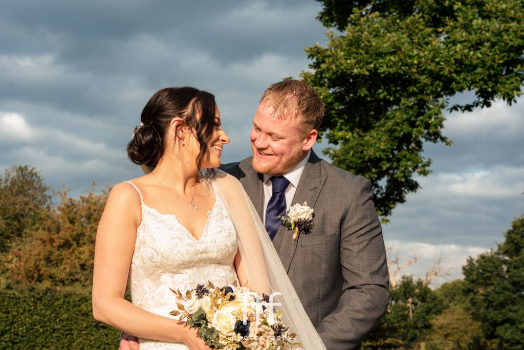Oak Farm Hotel bride and groom portrait in the sun