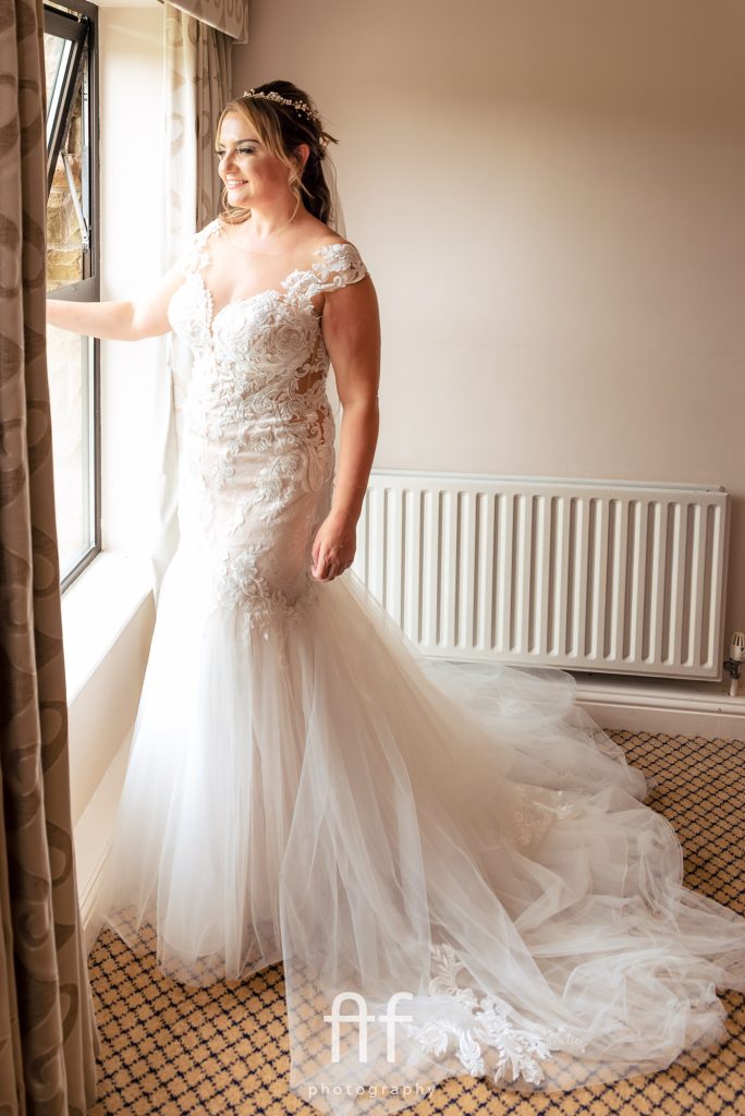 Bride having a moment before going to her ceremony.
